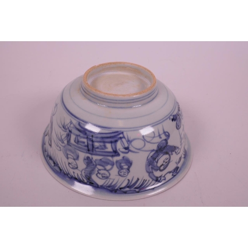 20 - A Chinese blue and white porcelain rice bowl decorated with figures flying kites, 5½