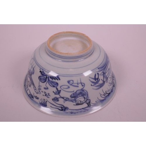 20 - A Chinese blue and white porcelain rice bowl decorated with figures flying kites, 5½