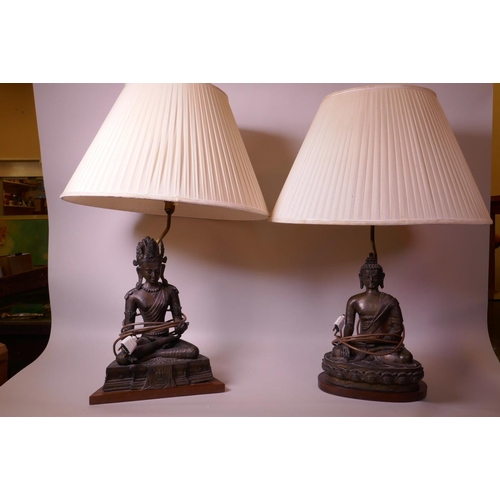 21 - A bronze table lamp, the base cast as Buddha seated in meditation (figurine 12