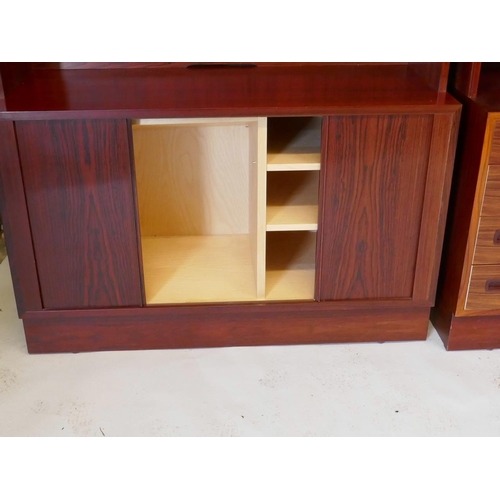 1205 - A pair of Hundevad 2 section hardwood cabinets, with adjustable shelves, one fitted with eight drawe... 