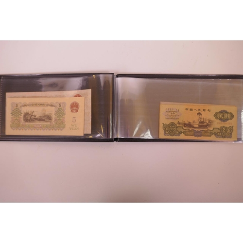 17 - A wallet of facsimile (replica) Chinese banknotes of assorted denominations, largest 6