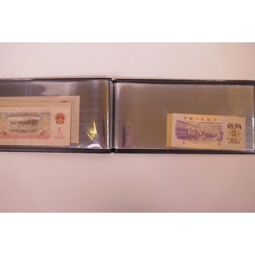 17 - A wallet of facsimile (replica) Chinese banknotes of assorted denominations, largest 6