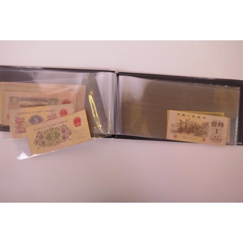 17 - A wallet of facsimile (replica) Chinese banknotes of assorted denominations, largest 6