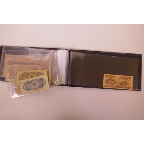 17 - A wallet of facsimile (replica) Chinese banknotes of assorted denominations, largest 6