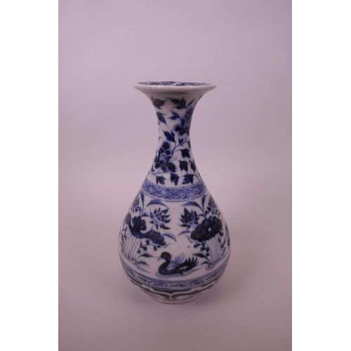 48 - A Chinese Ming style blue and white pottery pear shaped vase decorated with waterfowl in a lotus pon... 