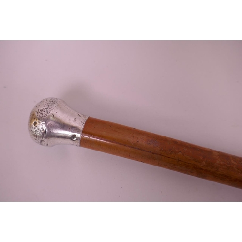 56 - A Malacca walking cane with white metal top, 36