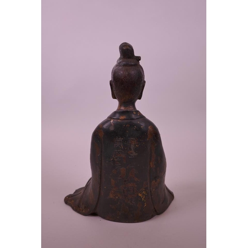 59 - A Chinese bronze of an emperor seated in contemplation, with a gilt and lacquer patina, 9½