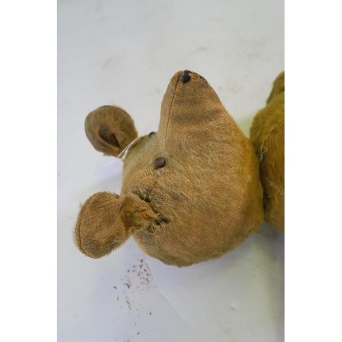 62 - An early C20th teddy bear, 23