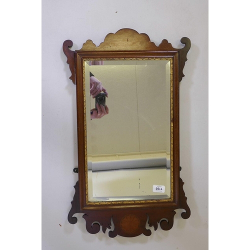 1195 - A Georgian style inlaid mahogany fret wall mirror, with bevelled glass and parcel gilt border, 27