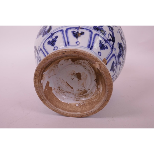 25 - A Chinese blue and white pottery vase, with two dragon handles and painted twin dragon decoration, f... 