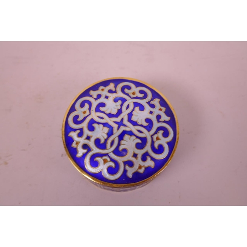 27 - An Islamic enamel trinket box, decorated with Islamic script, 3