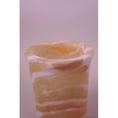 37 - An Egyptian alabaster cylinder vase, 4½