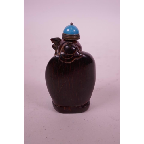 39 - A Chinese carved horn snuff bottle in the form of Shao Lao holding a peach, 3