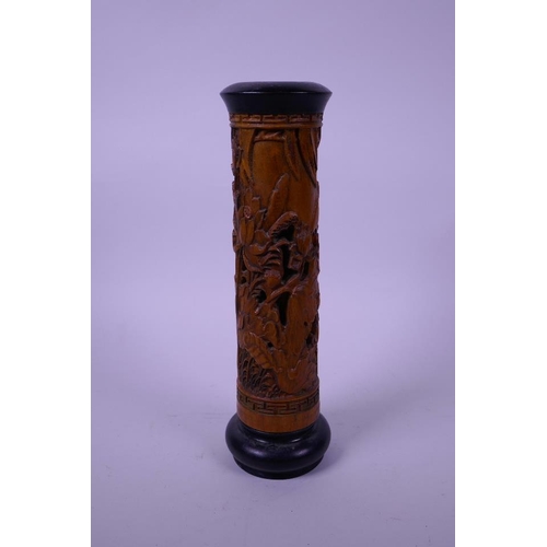 5 - A Chinese carved wood cylinder incense burner, decorated with carp in a lotus pond, 9½