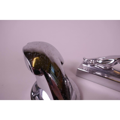 50 - A chrome plated Jaguar paperweight, 5