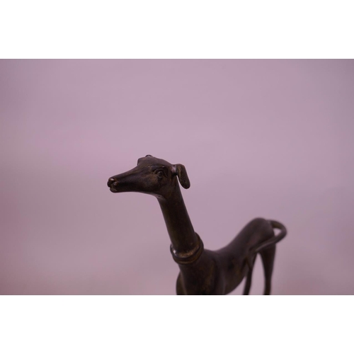 52 - A stylised bronze of a greyhound with a green patina 9