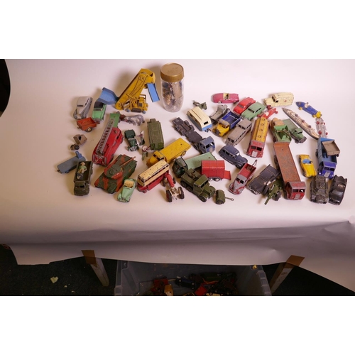 8 - A box containing a large quantity of Dinky toy vehicles, etc (used)