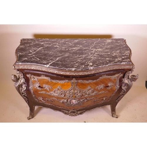 1210 - A Louis XV style tulipwood bombe shapped commode with brass mounts and inset marble top, 48