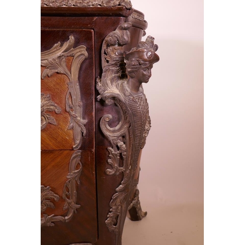 1210 - A Louis XV style tulipwood bombe shapped commode with brass mounts and inset marble top, 48