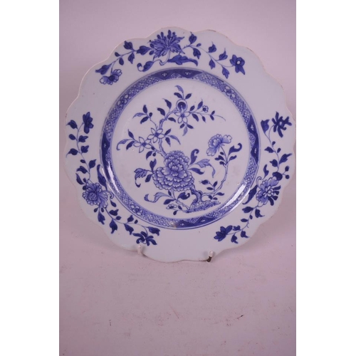 22 - A late C18th/early C19th tin glazed blue and white plate, decorated in the Chinese manner, with chry... 