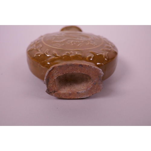 35 - A Chinese ochre glazed moon flask with two dragon handles and decoration, chips to base, 5