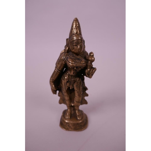 61 - An antique Indian bronze of a female deity, 4