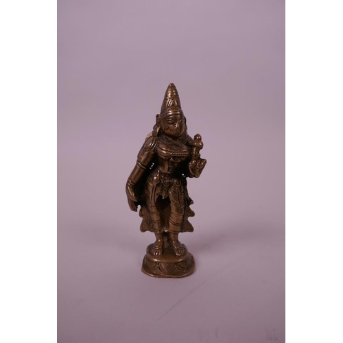 61 - An antique Indian bronze of a female deity, 4