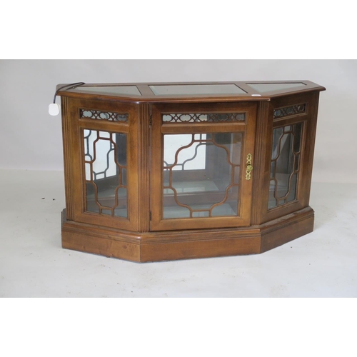 1227 - A walnut display cabinet with mirrored back and glazed top, fitted with illumination, 17