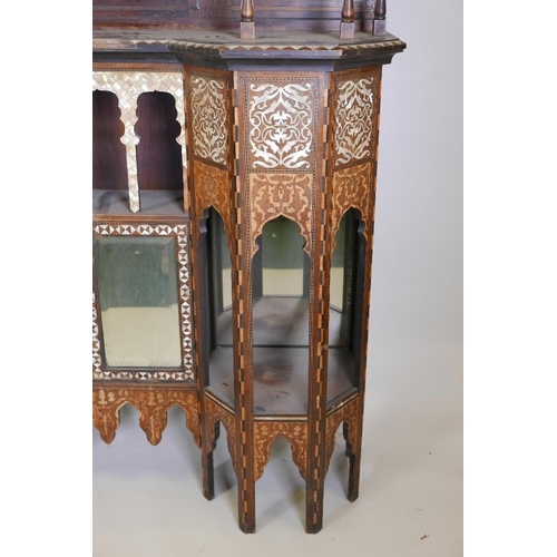 1215 - A late C19th Moorish side cabinet in the manner of Liberty, constructed of rosewood, inlaid with mot... 