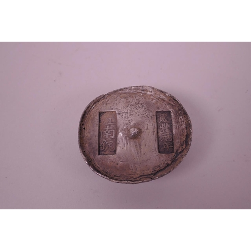 100 - A Chinese white metal trade token, impressed character marks, 2½