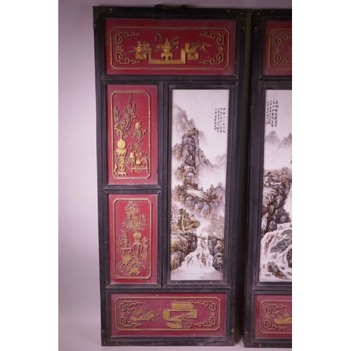 101 - A pair of large Chinese polychrome porcelain panels decorated with mountain landscape scenes, mounte... 