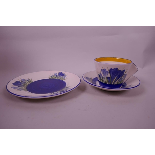 109 - A Wedgwood Clarice Cliff trio consisting of a conical teacup, saucer and plate in the blue crocus pa... 