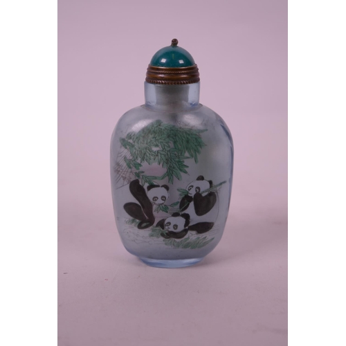 111 - A Chinese reverse painted glass snuff bottle decorated with pandas, 3