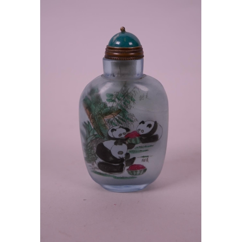 111 - A Chinese reverse painted glass snuff bottle decorated with pandas, 3