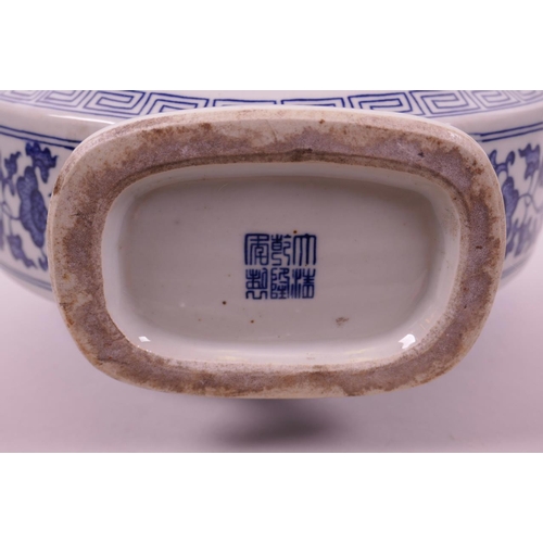 115 - A large Chinese blue and white porcelain two handled moon flask with decorative panels depicting the... 