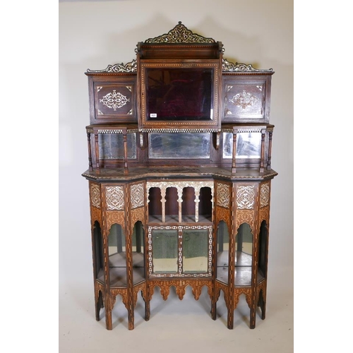 1215 - A late C19th Moorish side cabinet in the manner of Liberty, constructed of rosewood, inlaid with mot... 