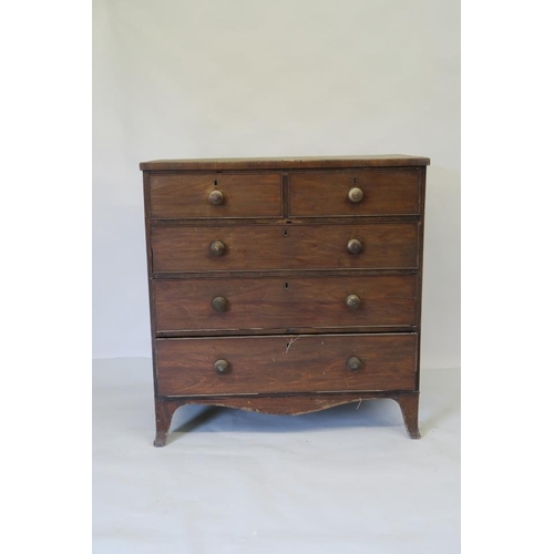 1224 - A C19th mahogany chest of two short over three graduated long drawers raised on swept bracket feet, ... 