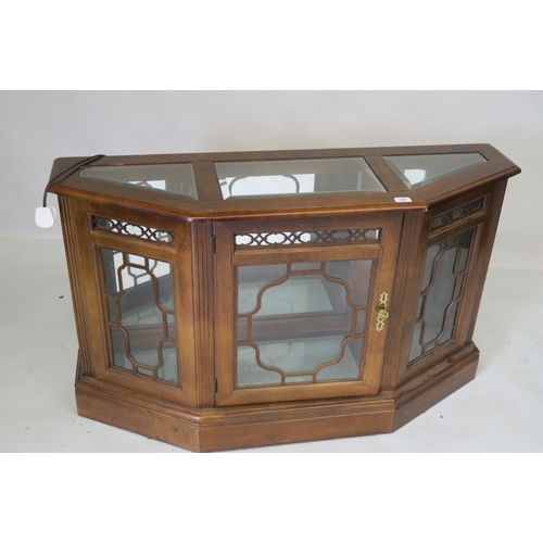 1227 - A walnut display cabinet with mirrored back and glazed top, fitted with illumination, 17