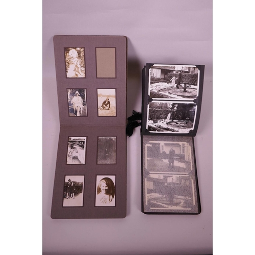 124 - Two early-mid C20th photograph albums portraying social history