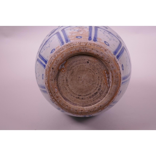 125 - A Chinese Ming style blue and white pottery double gourd vase with lotus flower decoration, 13½