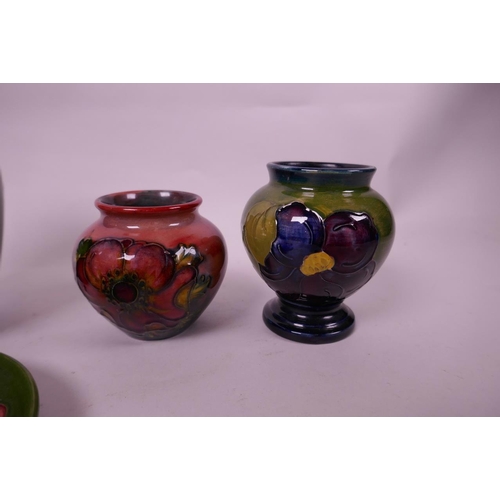 127 - Four small Moorcroft pottery vases and a matching saucer with floral decoration, largest 5