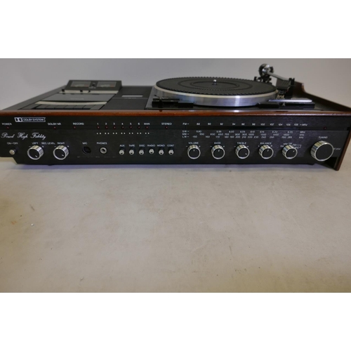 134 - A Garrard ST25 Music Centre with belt drive turntable stereo cassette recorder/player and FM radio, ... 