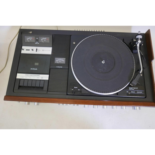 134 - A Garrard ST25 Music Centre with belt drive turntable stereo cassette recorder/player and FM radio, ... 