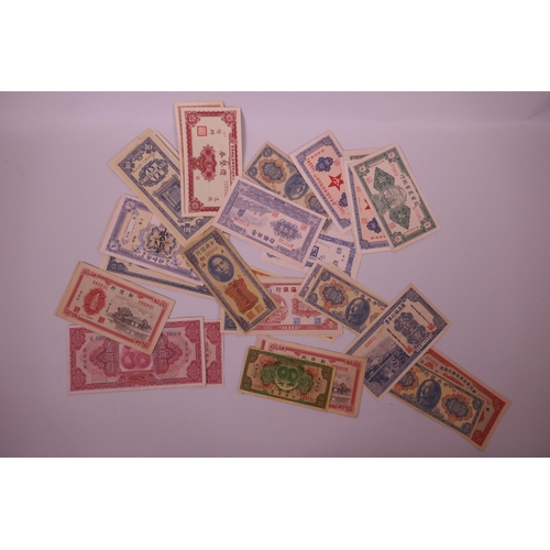 18 - A large quantity of facsimile (replica) Chinese banknotes of assorted denominations, largest 7