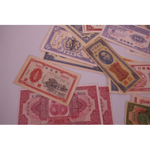 18 - A large quantity of facsimile (replica) Chinese banknotes of assorted denominations, largest 7