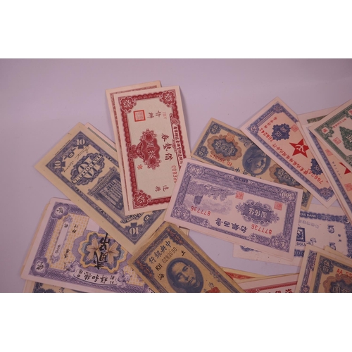 18 - A large quantity of facsimile (replica) Chinese banknotes of assorted denominations, largest 7