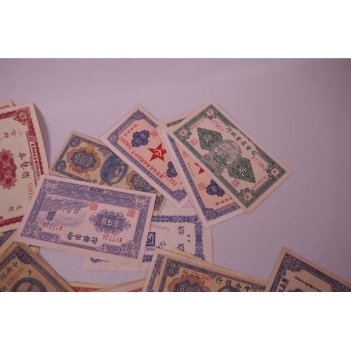 18 - A large quantity of facsimile (replica) Chinese banknotes of assorted denominations, largest 7