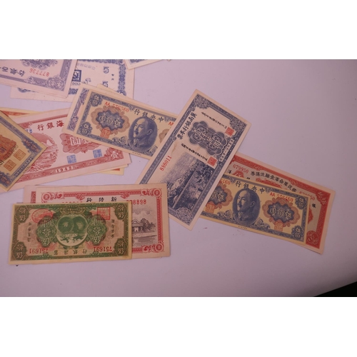 18 - A large quantity of facsimile (replica) Chinese banknotes of assorted denominations, largest 7