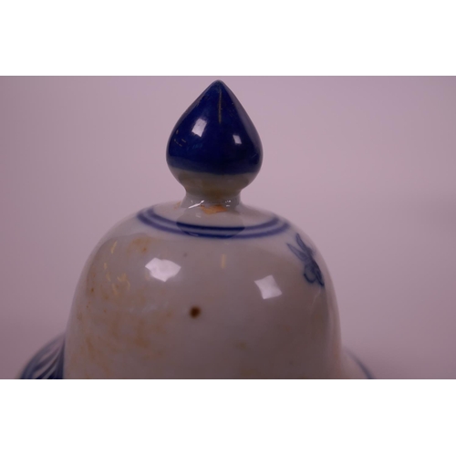 3 - A Chinese blue and white porcelain jar and cover decorated with women and children in a garden, 9½