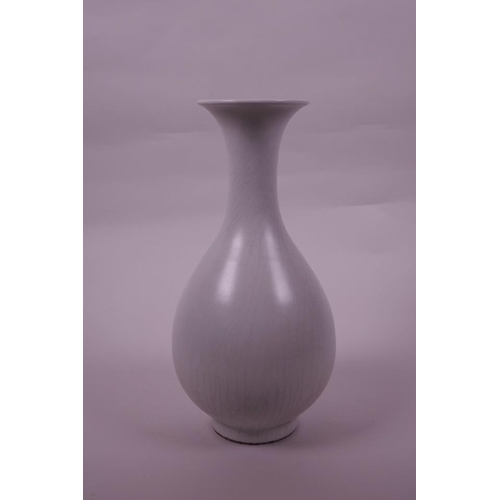 43 - A Chinese pear shaped porcelain vase with a white crackle glaze, 6 character mark to base, 10